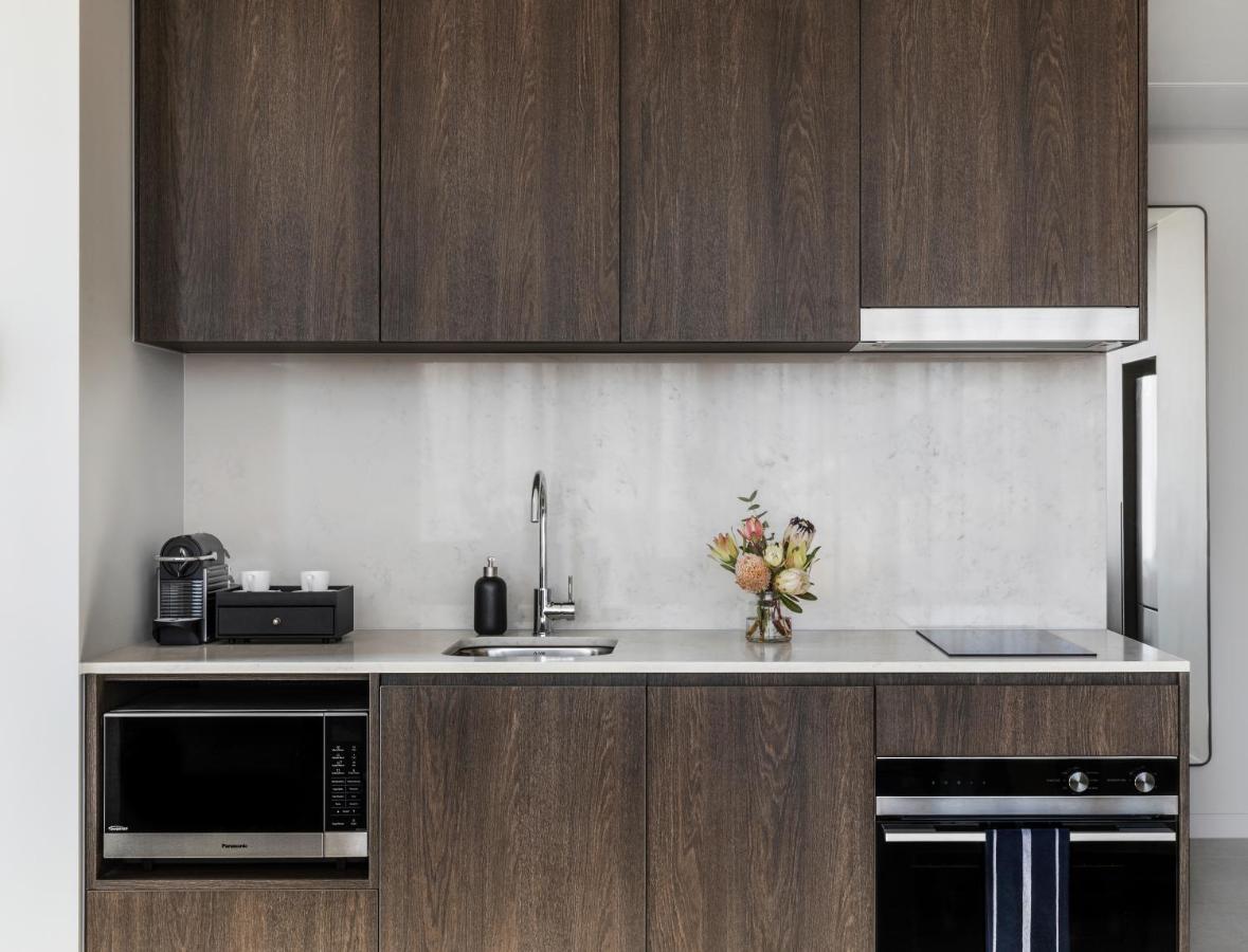 Aparthotel Oakwood Premier Ville de Melbourne Extérieur photo A kitchen in a typical apartment