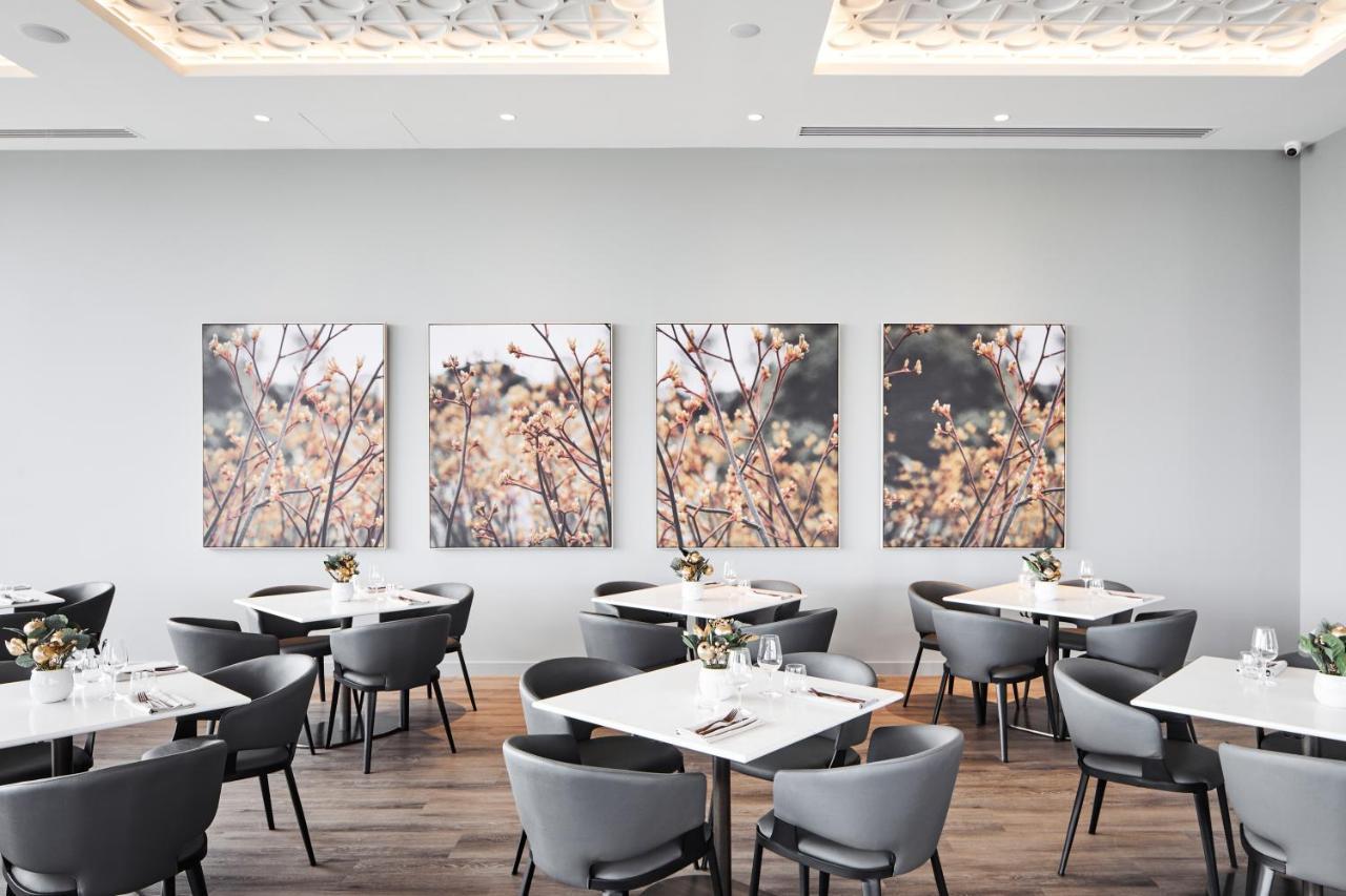 Aparthotel Oakwood Premier Ville de Melbourne Extérieur photo The interior of the restaurant