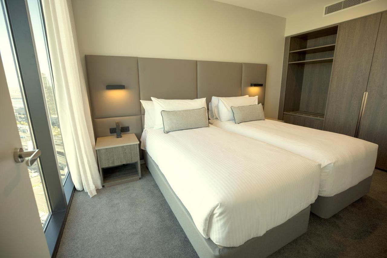 Aparthotel Oakwood Premier Ville de Melbourne Extérieur photo A bedroom at the hotel